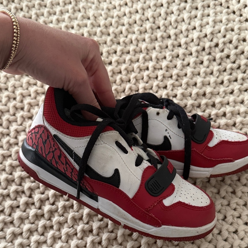 Nike Kids Red and White Jordans with Black Accents